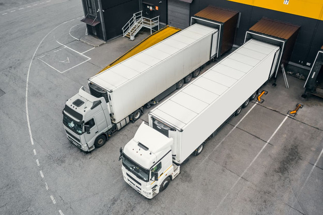 two trucks loading distribution hub.jpg