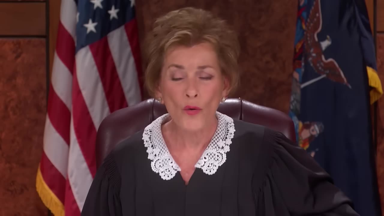 Frame 5 from the courtroom hearing
