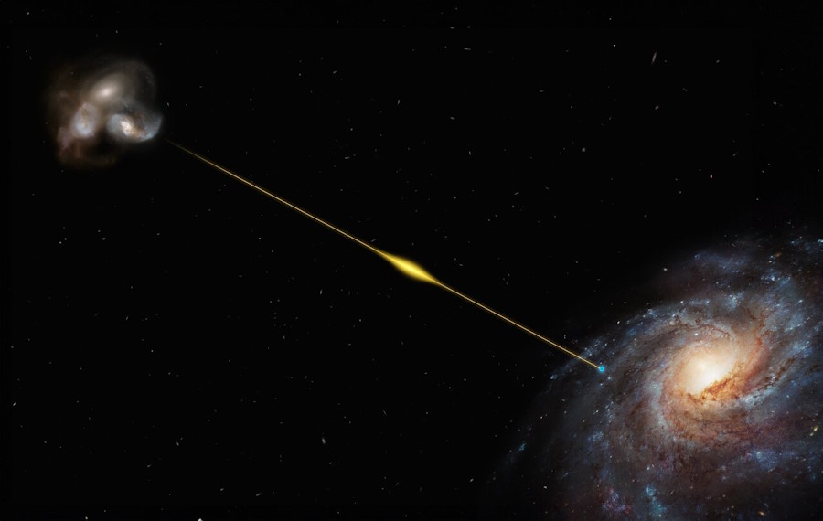This artist’s impression (not to scale) illustrates the path of the fast radio burst FRB 20220610A, from the distant galaxy where it originated all the way to Earth, in one of the Milky Way’s spiral arms. The source galaxy of FRB 20220610A, pinned down thanks to ESO’s Very Large Telescope, appears to be located within a small group of interacting galaxies. It’s so far away its light took eight billion years to reach us, making FRB 20220610A the most distant fast radio burst found to date. Image Credit: ESO/M. Kornmesser This artist’s impression (not to scale) illustrates the path of the fast radio burst FRB 20220610A, from the distant galaxy where it originated all the way to Earth, in one of the Milky Way’s spiral arms. The source galaxy of FRB 20220610A, pinned down thanks to ESO’s Very Large Telescope, appears to be located within a small group of interacting galaxies. It’s so far away its light took eight billion years to reach us, making FRB 20220610A the most distant fast radio burst found to date. Image Credit: ESO/M. Kornmesser