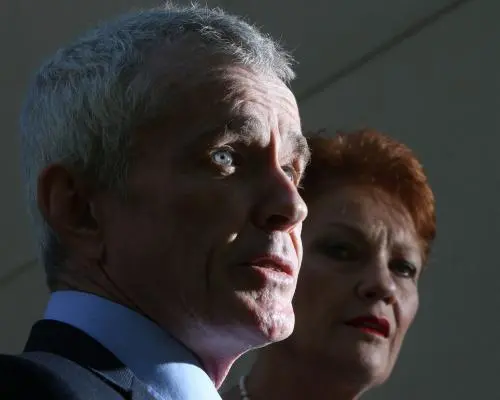 Senator Roberts' Conspiracy Theories Under Scrutiny Amid One Nation's Rise