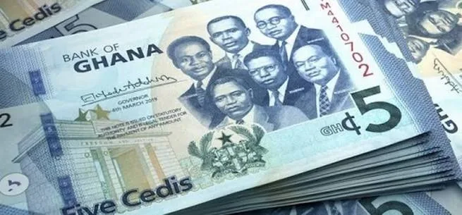 Illustration - Ghana : le cedi, ex-star des monnaies africaines, plonge et les commerçants trinquent