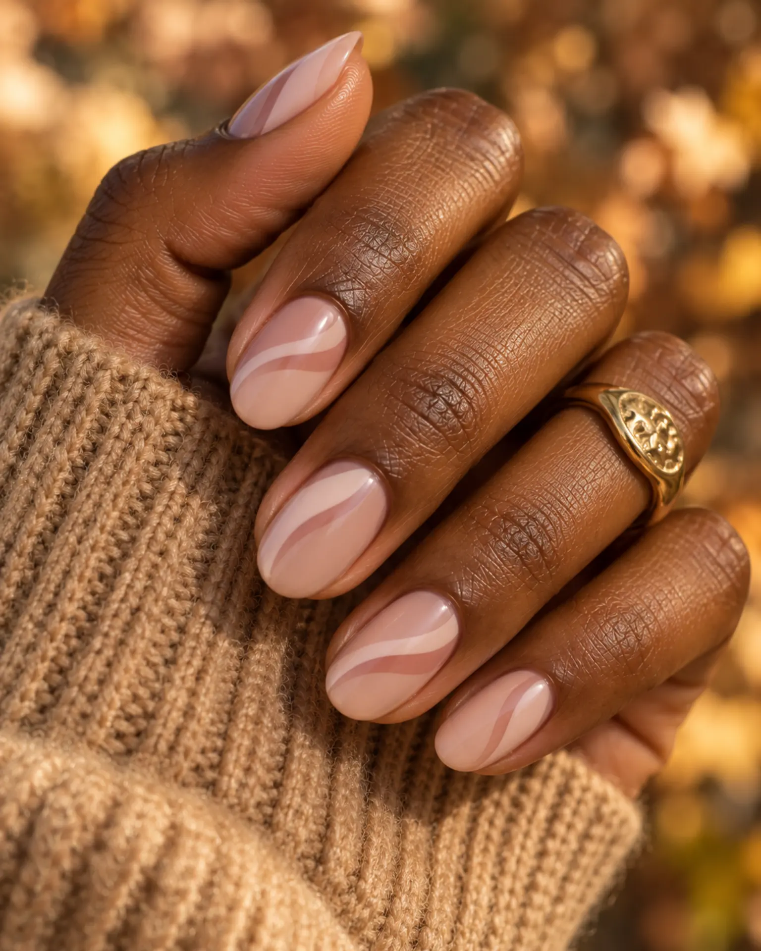 Nude Negative-Space Curve manicure inspiration for nude nail ideas