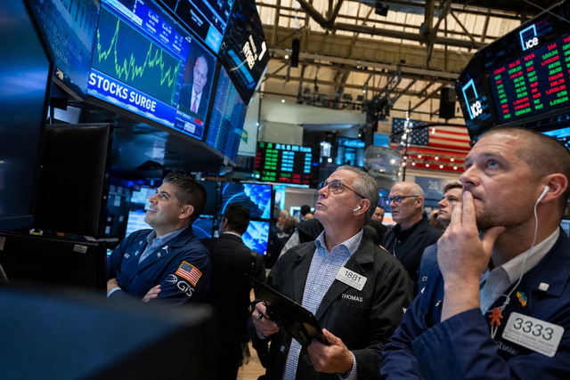 A Wall Street trading floor with traders watching monitors displaying rising index charts, financial news documentary photography