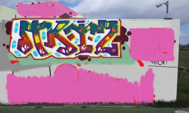 Graffiti artwork by Tkiz