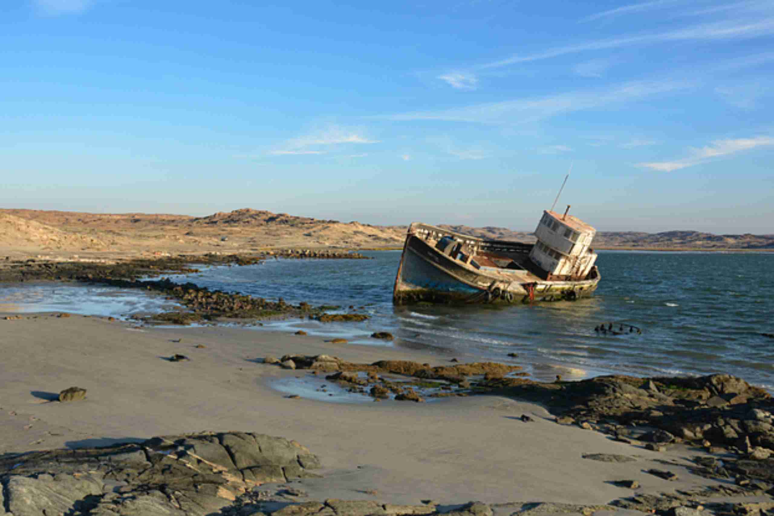 An image showing the shipwreck graveyard at the Skeleton Coast, Namibia.