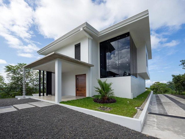 Modern rental property in Jaco, Costa Rica with tropical surroundings, showcasing options available in the short-term and long-term rental market for international tenants