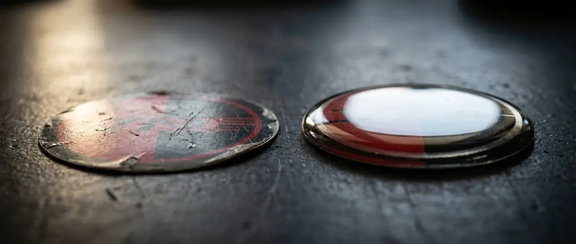 domed-sticker-vs-flat-sticker.webp