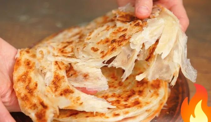 Постер Слоёные лепёшки на сковороде