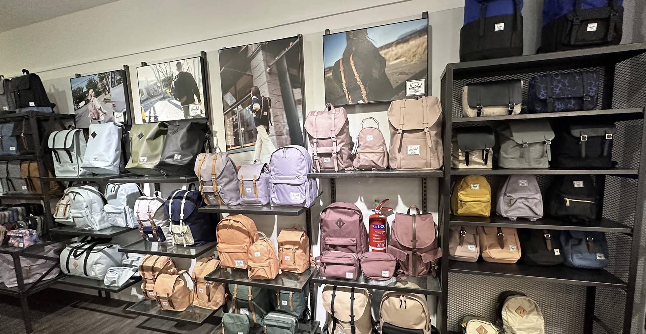 Herschel backpacks and travel bags on display