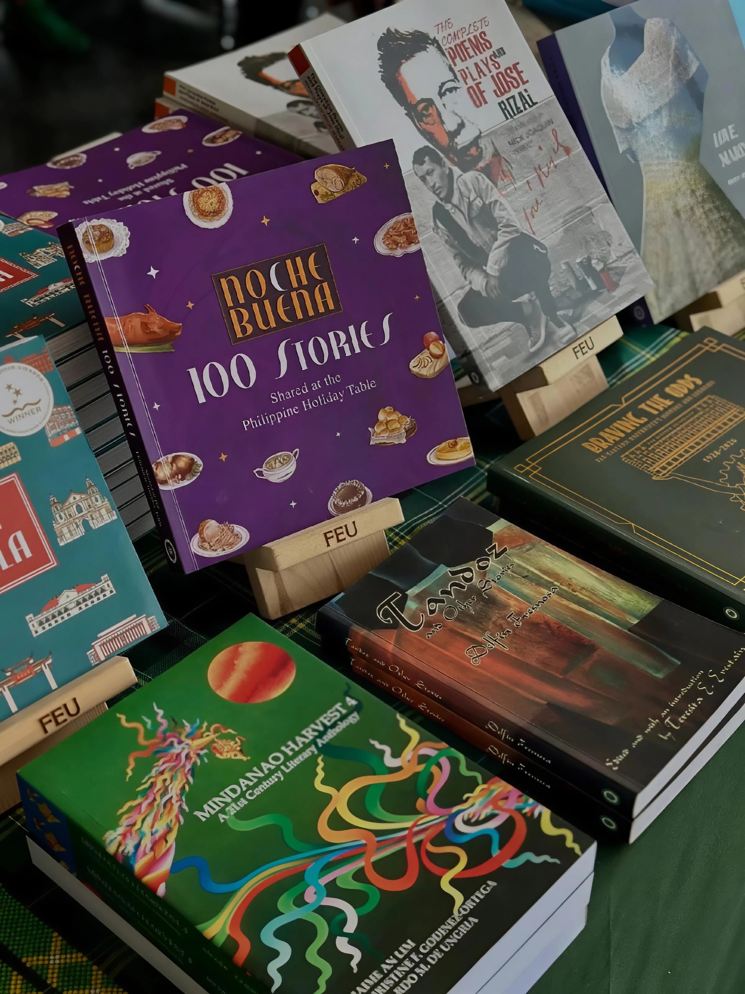 Visitors exploring publisher stalls and book displays