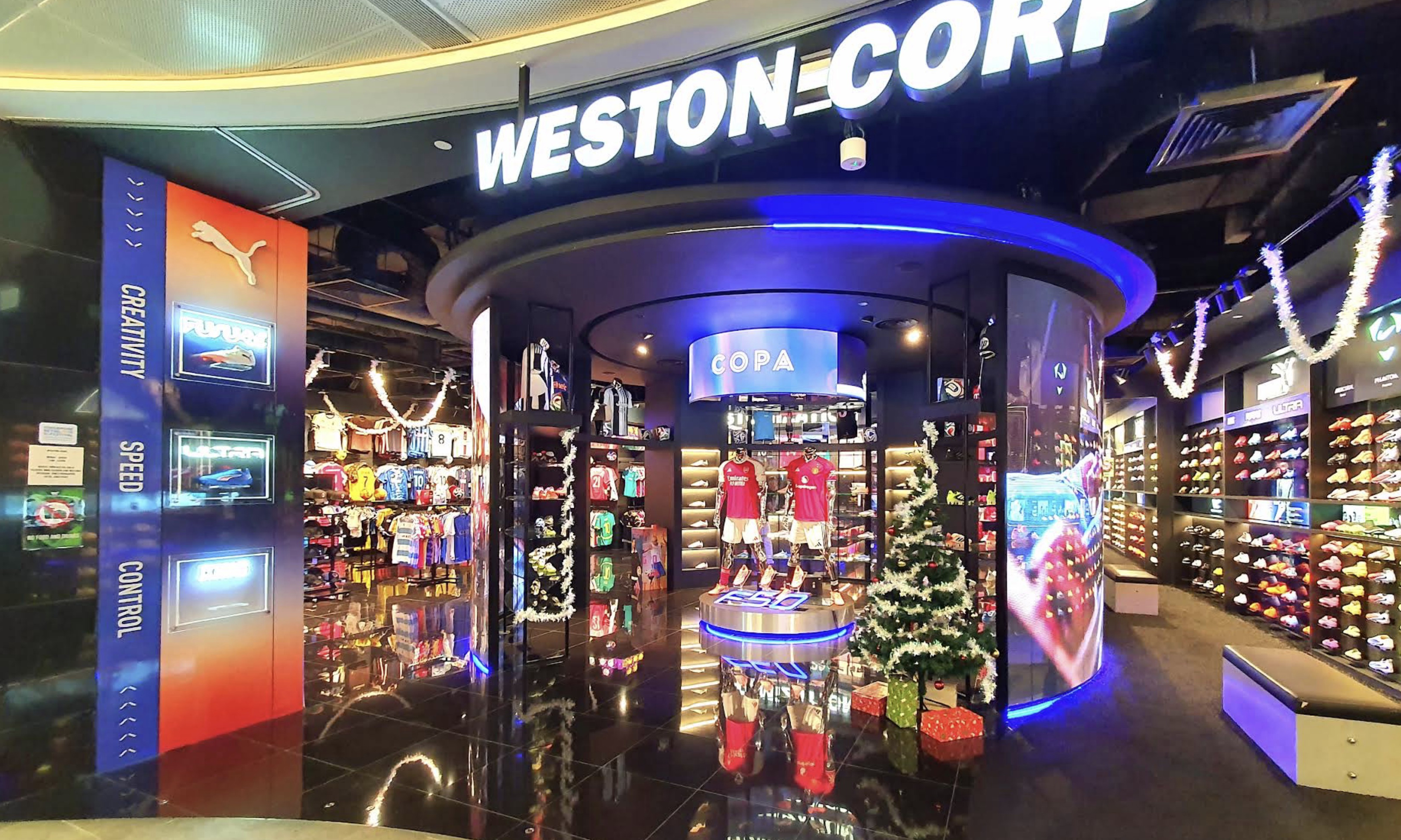 Football boots and apparel display at Weston Corp 313@somerset