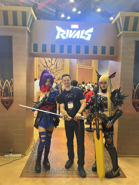 Marvel Rivals booth entrance with cosplayers