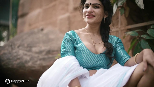 Resmi-R-Nair-Teasing-In-White-Saree-12