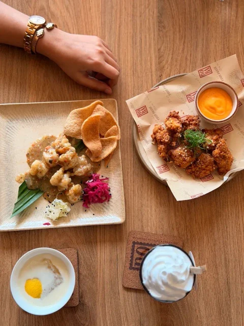 Full table feast with sharing platters and gourmet dishes at NOBA