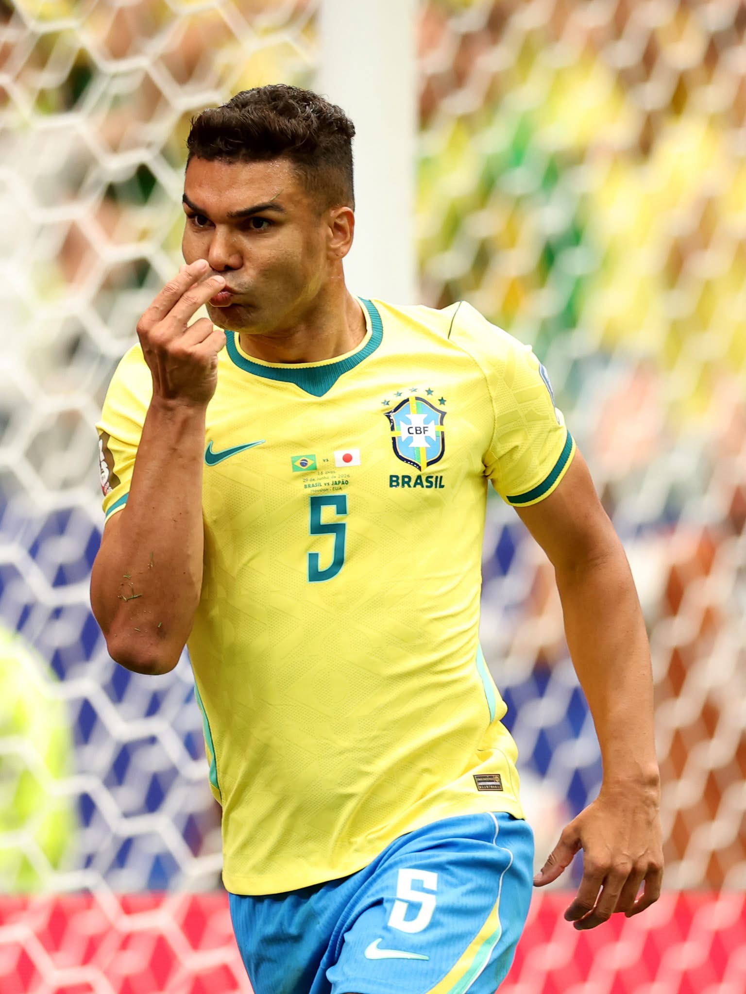 Brazil's Casemiro celebrating his crucial equalizing goal against Japan in the Round of 32.
