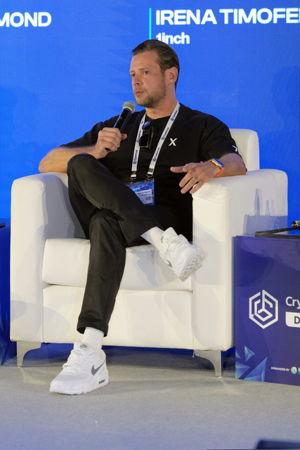 James Richmond speaking on stage