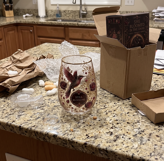 Glass cup on a wooden shelf