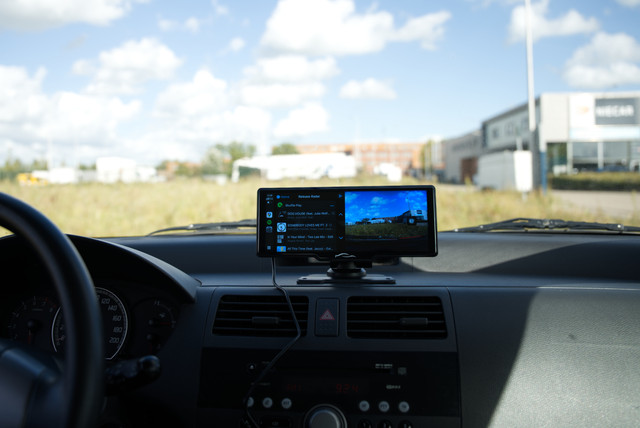 CarTablet Pro Max mounted on the dashboard of a car