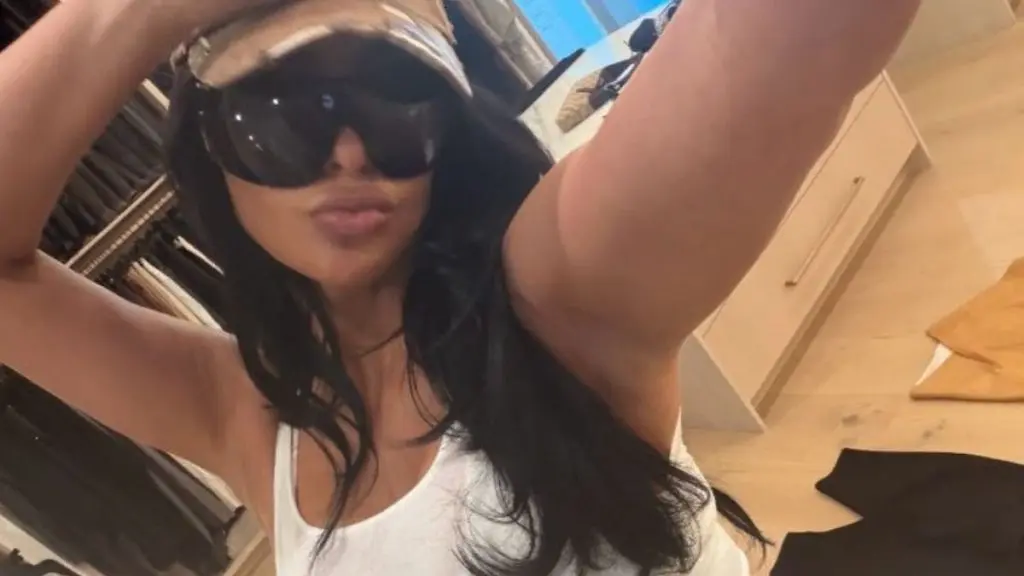 Kim Kardashian's Thong Peeks from Daring Bikini