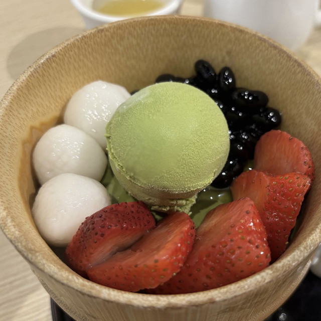 Matcha soft serve, shiratama rice dumplings and fruit in a Japanese dessert bowl
