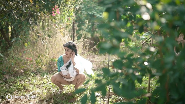Resmi-R-Nair-Teasing-In-White-Saree-19