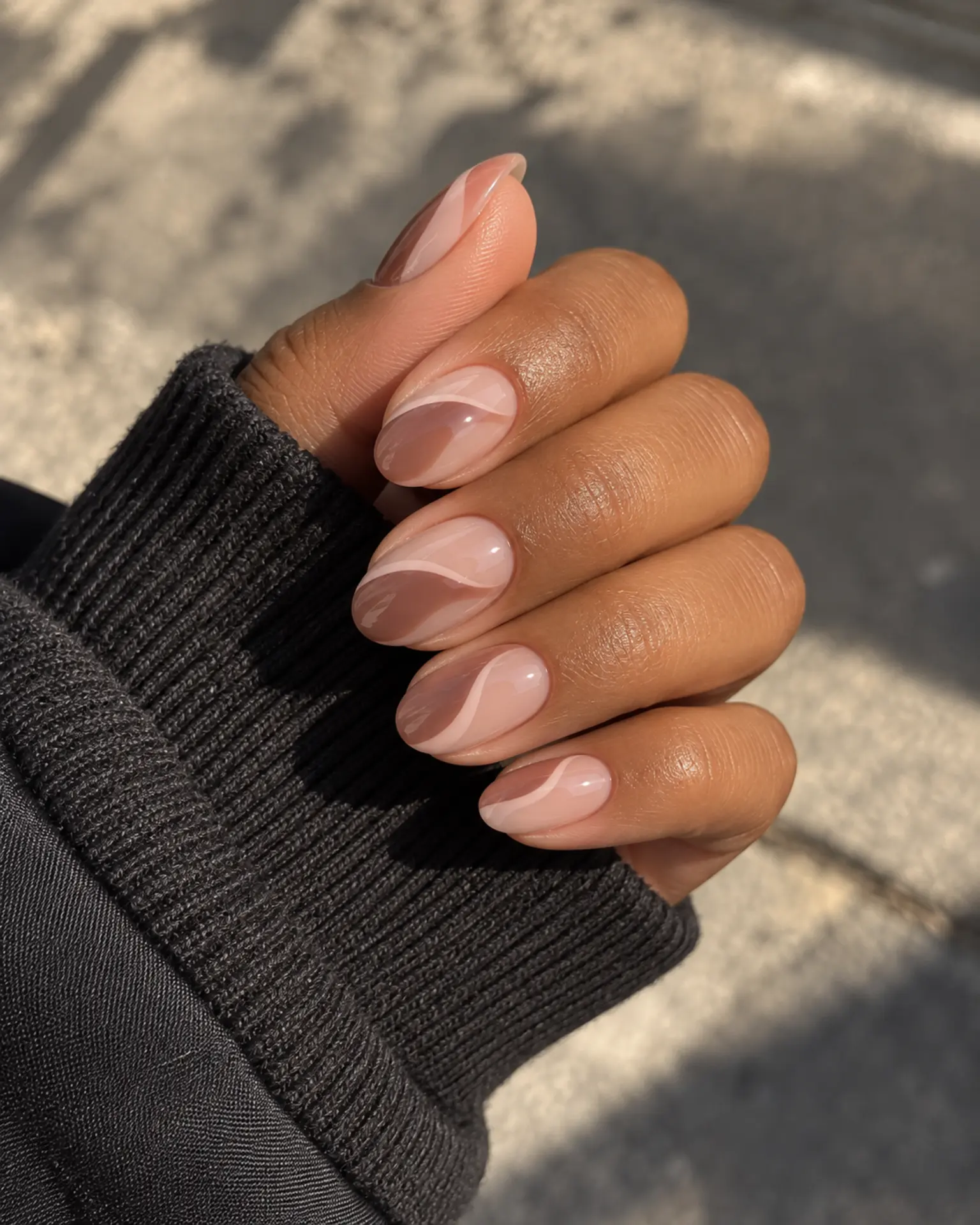Round Negative-Space Curve manicure inspiration for round nail ideas