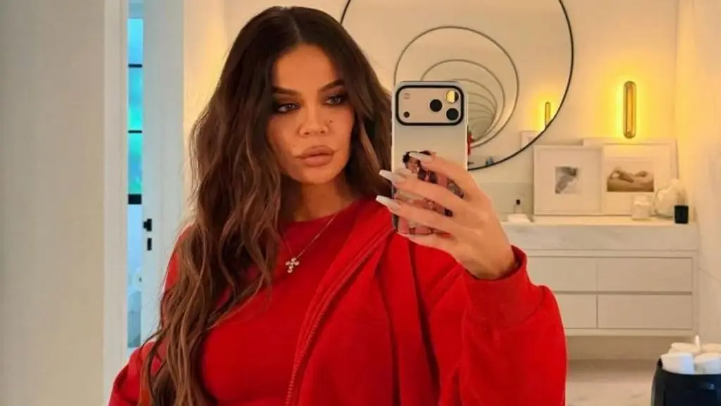 Khloe Kardashian's Wet Look Stuns in Sheer Dress