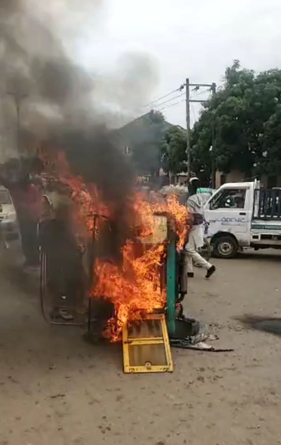 Vigilantes handing over the suspects to the police