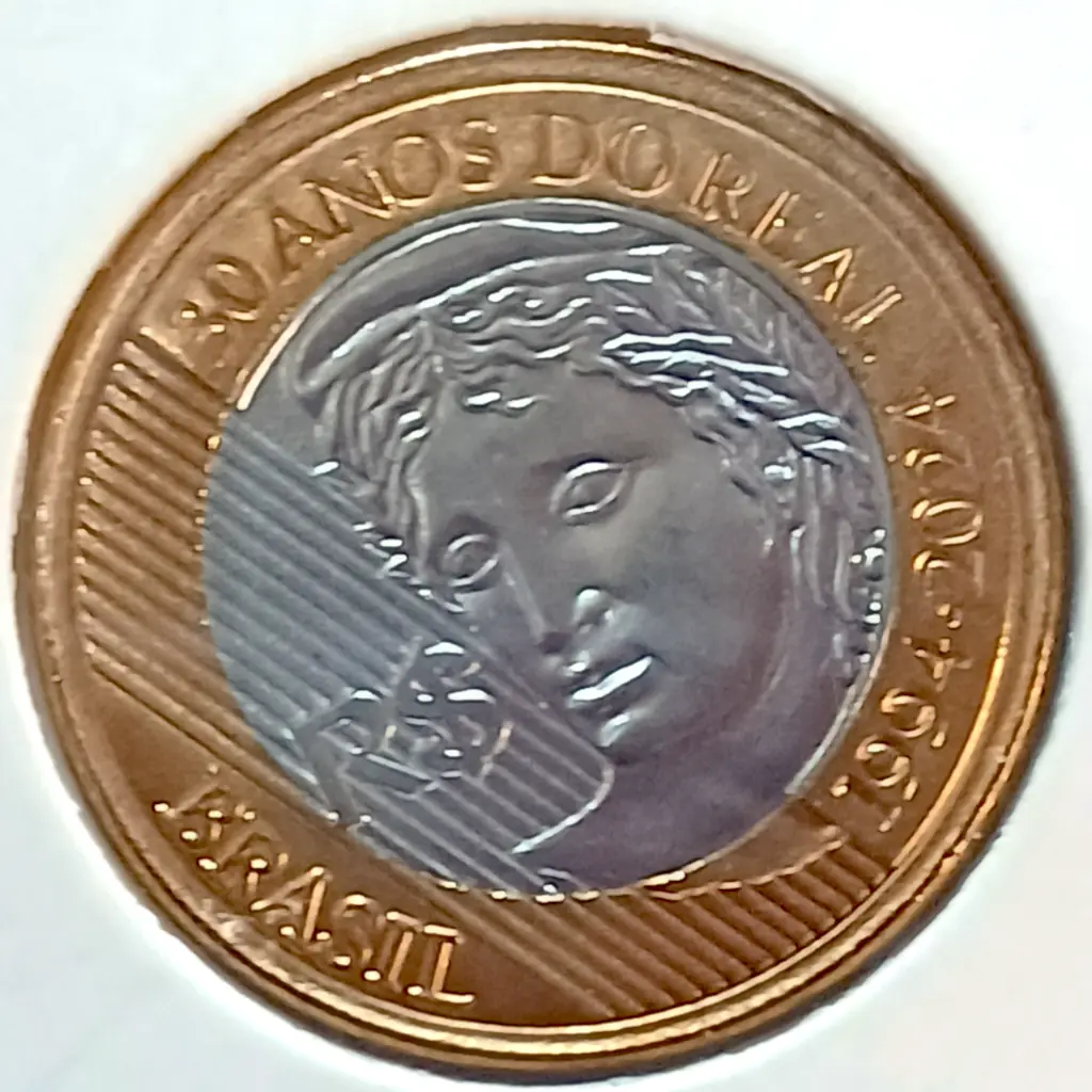 Moeda 1 Real 2024 – 30 Anos do Real Reverso Inclinado 36° à Esquerda – Flor de Cunho do Sachê.