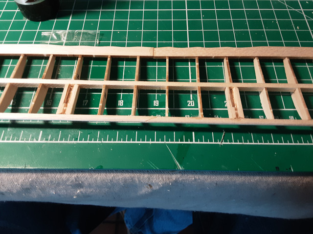 It's not in the plans, but I made pockets where the struts join the top wing. It helps avoid tearing the tissue when you assemble the plane.