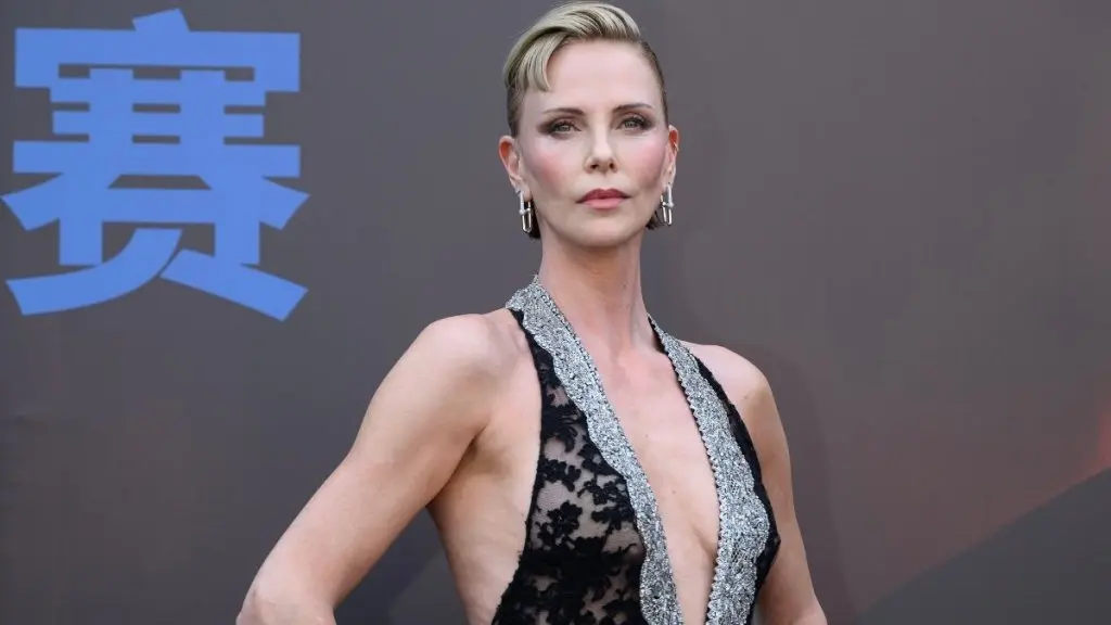 Charlize Theron Dazzles in Sheer Gown at Beijing Event