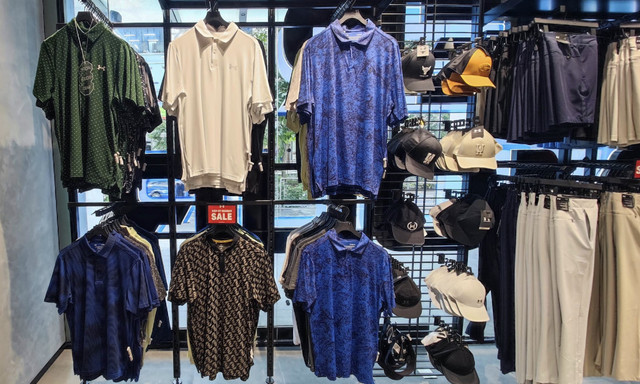 Under Armour apparel and caps displayed at Orchard Central