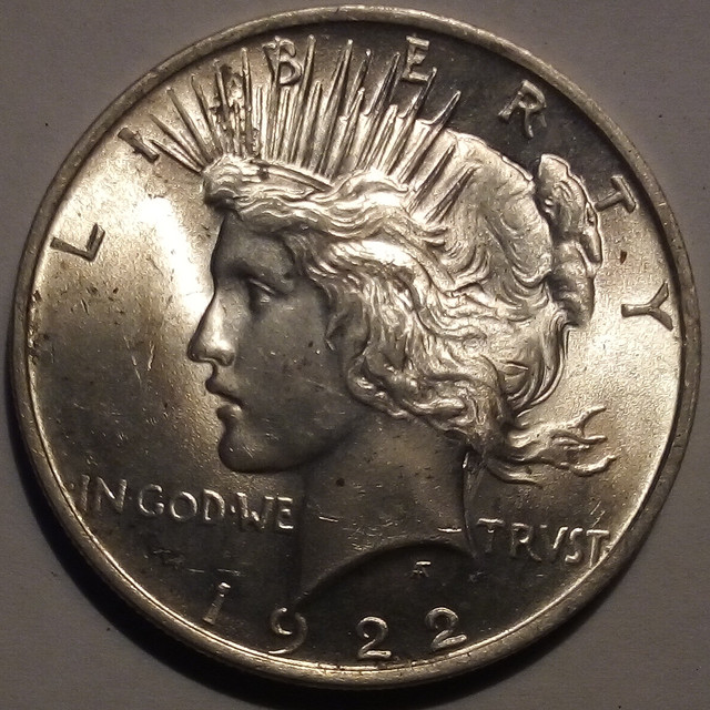 I-Have-A-1922-Peace-Dollar-With-Lots-Of-Doubling.