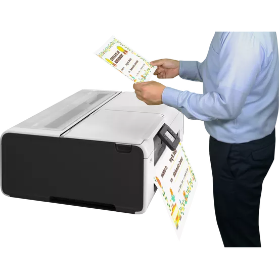 Person examining scanned document output from Canon imagePROGRAF TC-21M printer