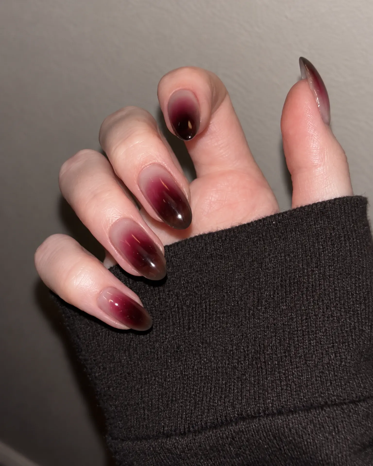 Merlot Center Glow manicure inspiration for dark aura nail ideas
