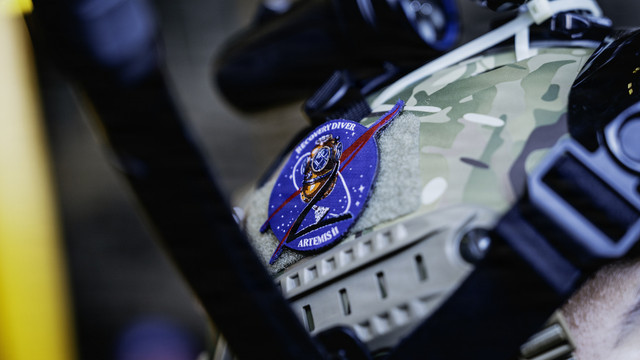Patch on helmet of U.S. Navy diver