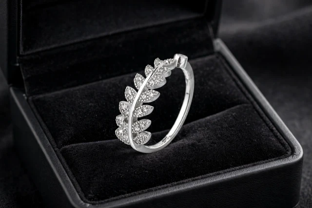silver leaf ring velvet box.webp