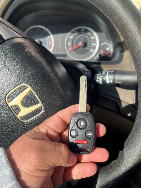 Honda remote head key with cracked shell at blade screw — Rockland Locksmith Spring Valley NY