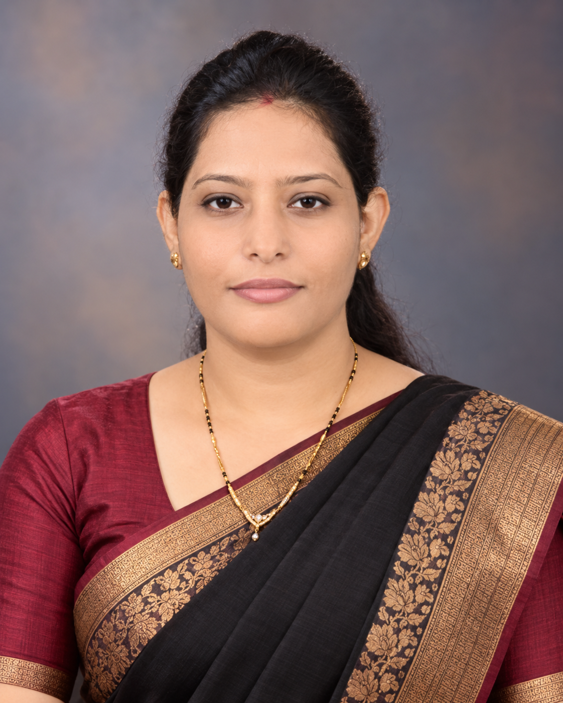 Dr. Manju