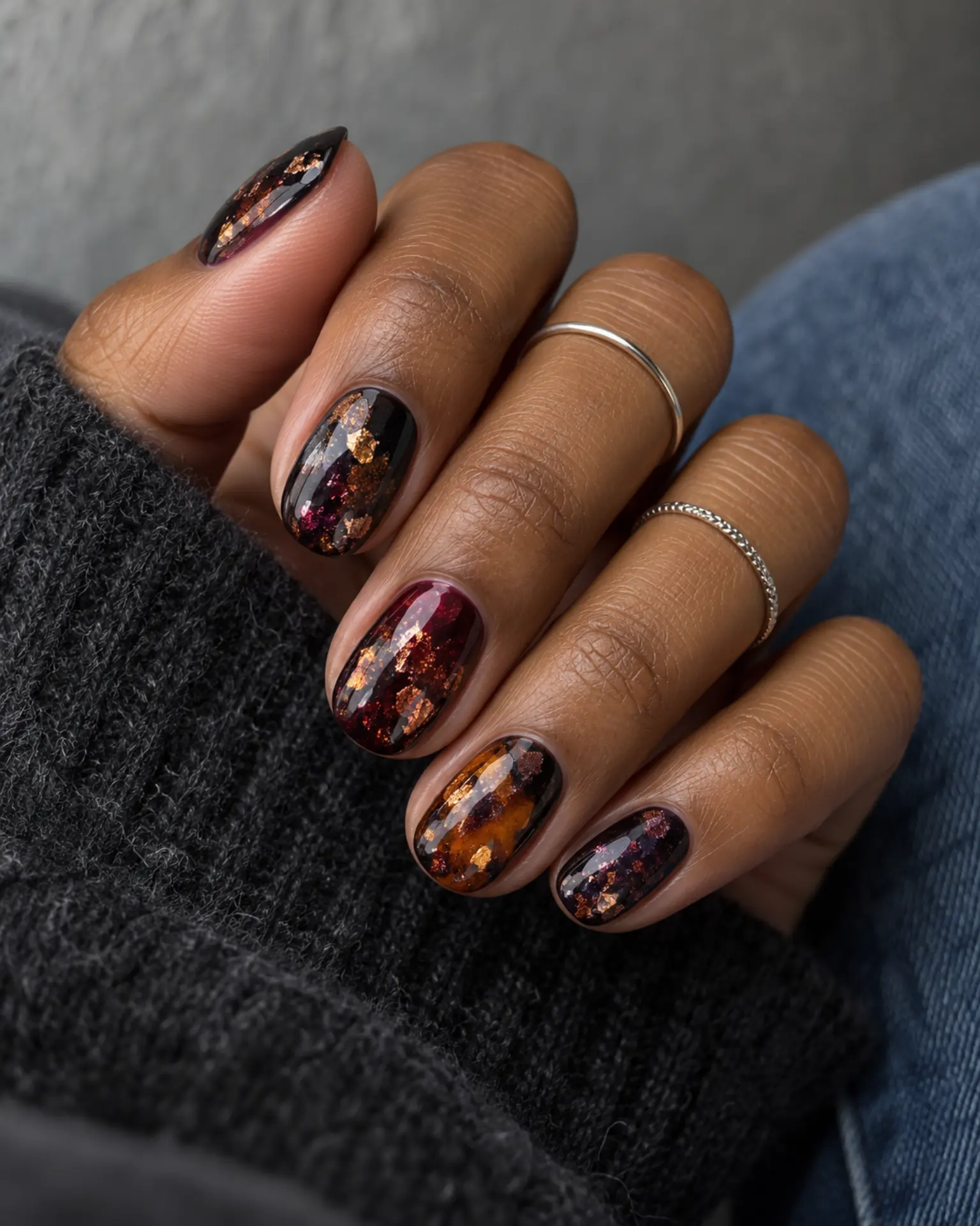 Halloween Foil-Flake Accent manicure inspiration for halloween nail ideas