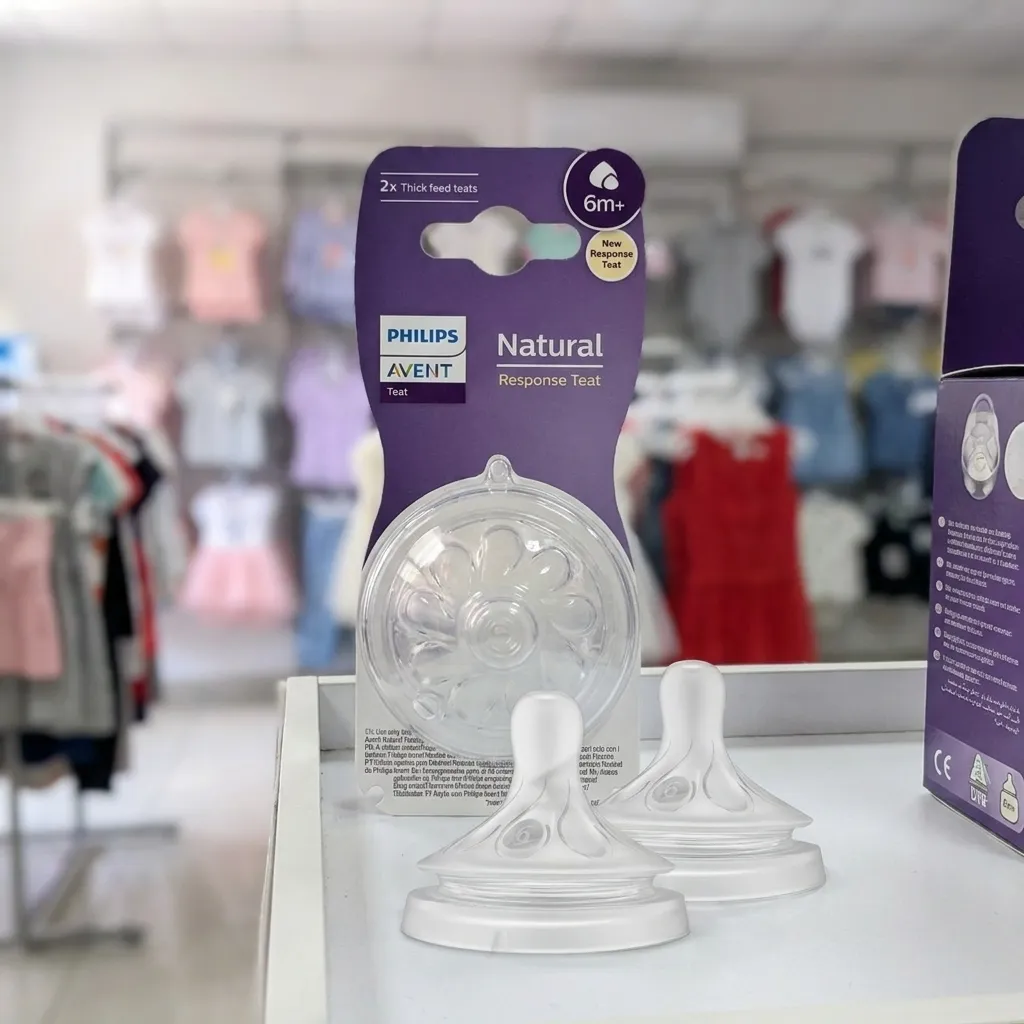 Anatomía de la tetina Natural Response Philips Avent — válvula floral visible en el empaque Thick Feed 6m+
