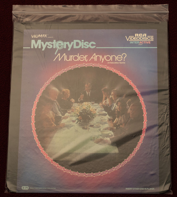54. Box Set - Mysterydisc - Murder Anyone? - d. Disc Front.jpg
