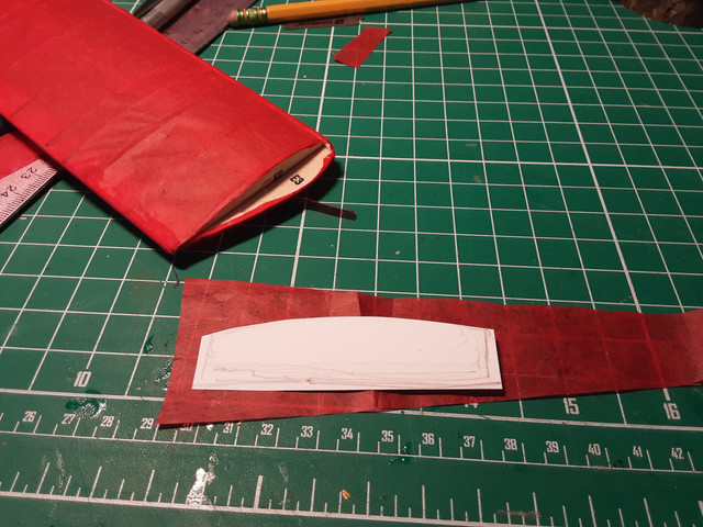 It's now time to cover the wingtips. It takes an airfoil-ish piece to do it. Since the Dr.1 has 6 wingtips, it's convenient to make a pattern.