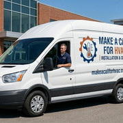 Technician installing HVAC system