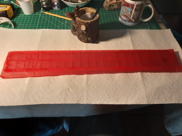 The top wing. I should have sanded off the E3 before I covered it because those numbers will show through multiple layers of paint. Dumas gives you a chart of all the pieces' shapes instead of putting numbers on each part.
