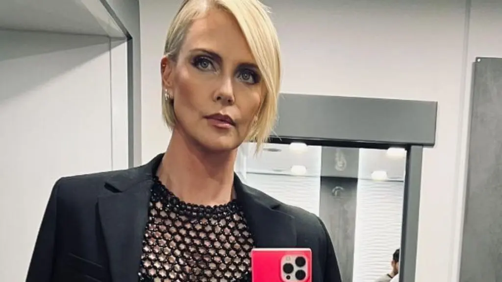 Charlize Theron Debuts Bold Tailored Look in Paris