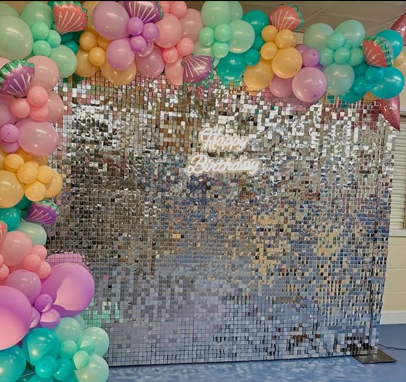 Elegant shimmer wall backdrop with subtle lighting