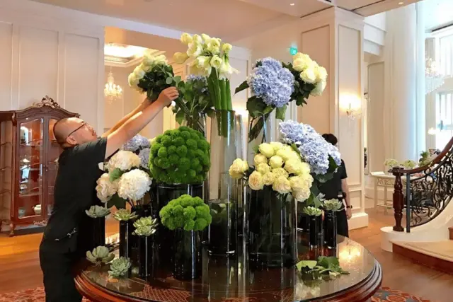 flower arrangement hotel lobby entrance commercial real estate venue Canada professional staging