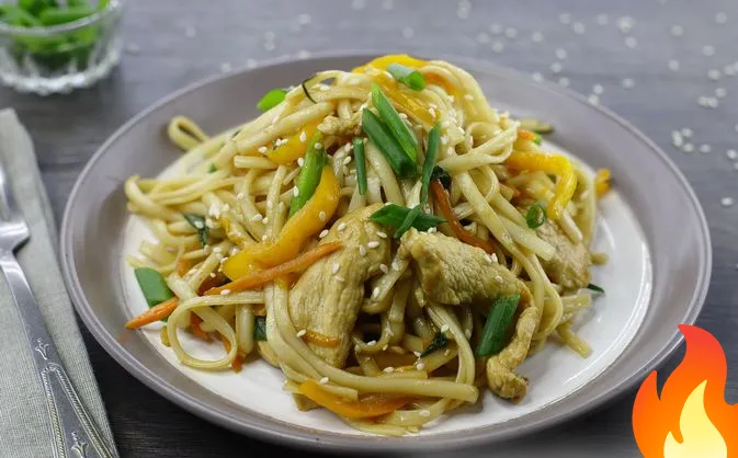 Фото Лапша удон с курицей в апельсиново-соевом соусе