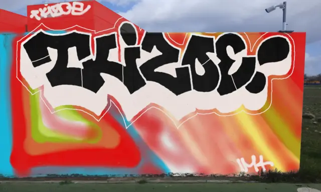 Graffiti artwork by Tkiz